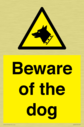 beware-of-the-dog-with-dog-warning-symbol~